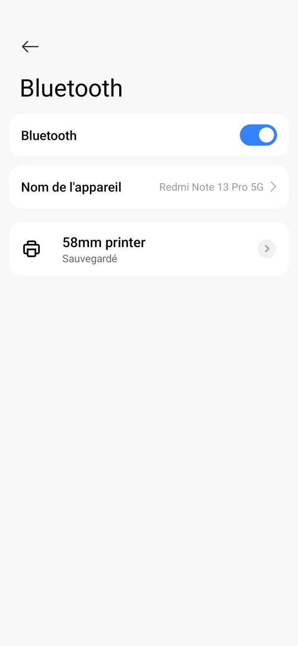 Paramètres Bluetooth d’Android avec une imprimante associée, « 58mm printer », indiquée comme Sauvegardé